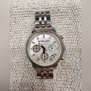 Silver, Michael Kors watch with mother of pearl face